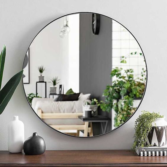 Miroir rond cadre en  métal